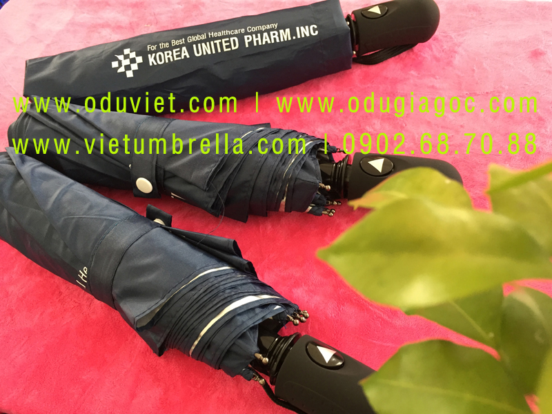 xưởng sản xuất ô dù cầm tay in logo quảng cáo